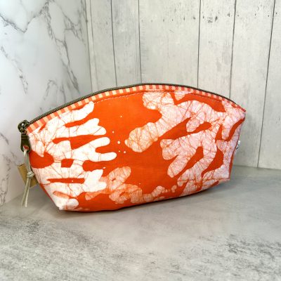 Coral and white batik reef print makeup pouch