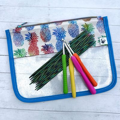 multicolor pineapple print and clear glitter vinyl flap zipper pouch